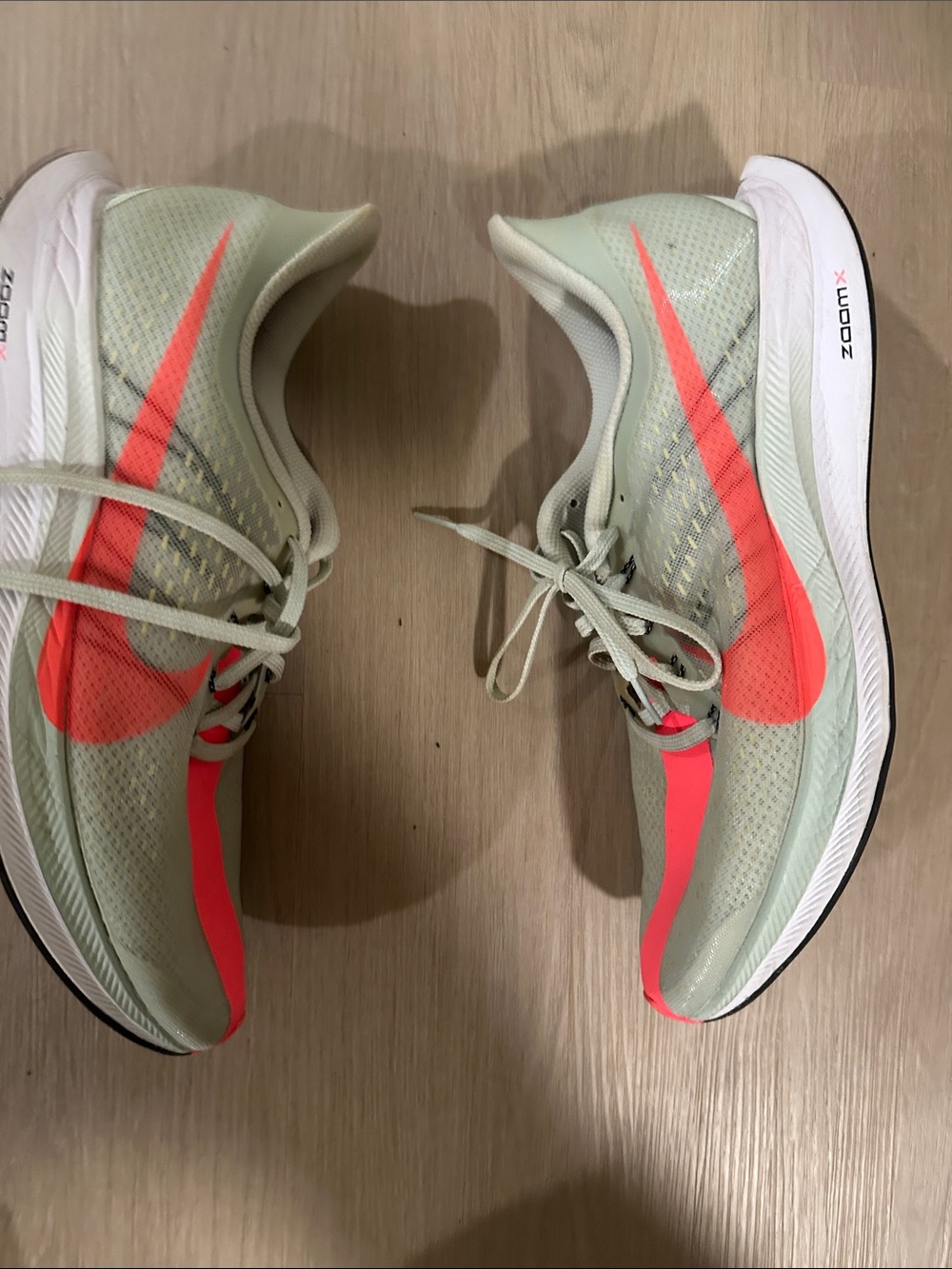 Nike Men’s Mint Green Running Shoes with Coral Swoosh